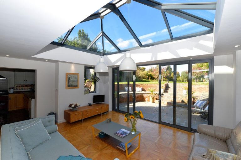 aluminium lantern roof in a lounge extension with sliding doors to garden