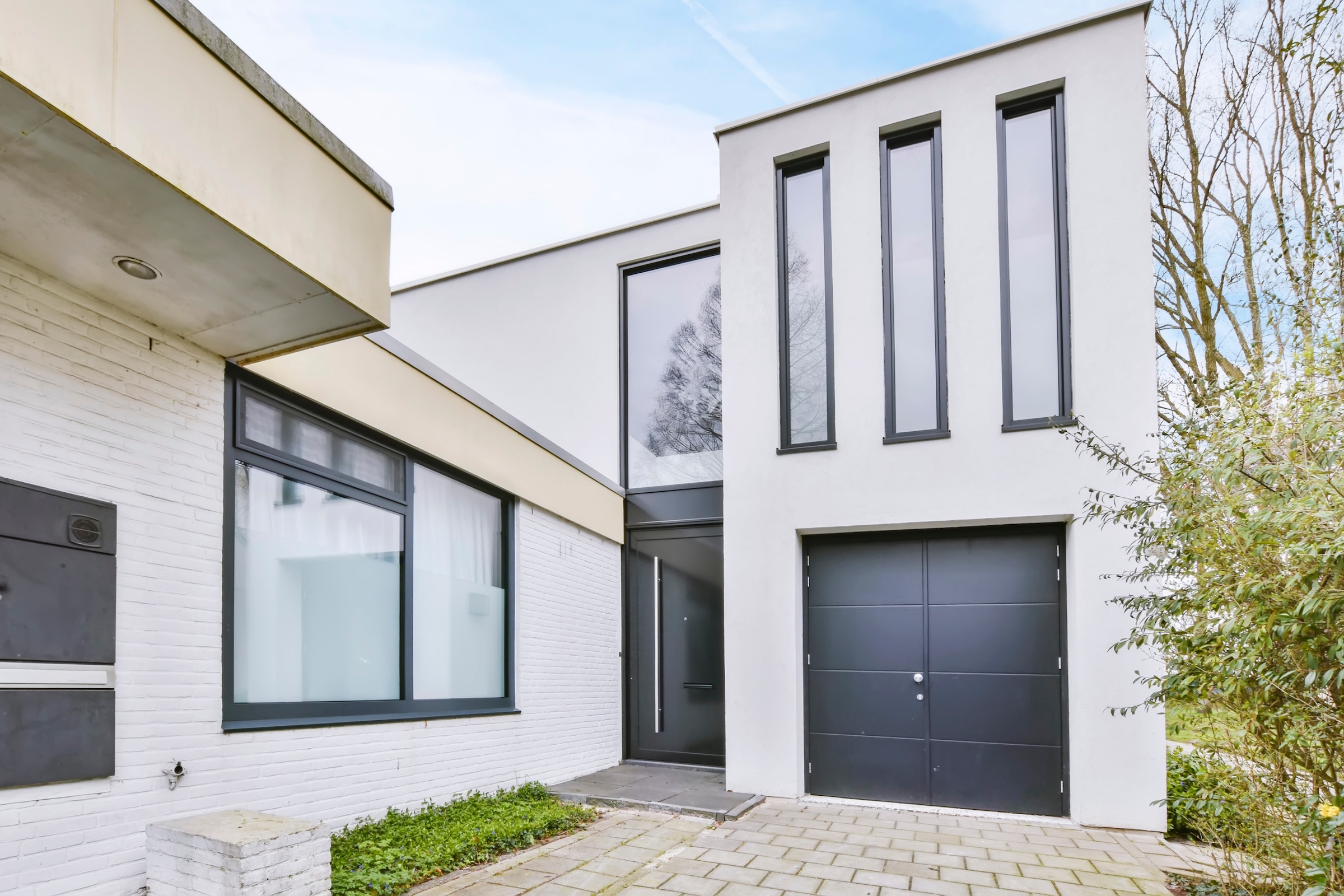 Origin grey ow70 windows in a white contemporary house