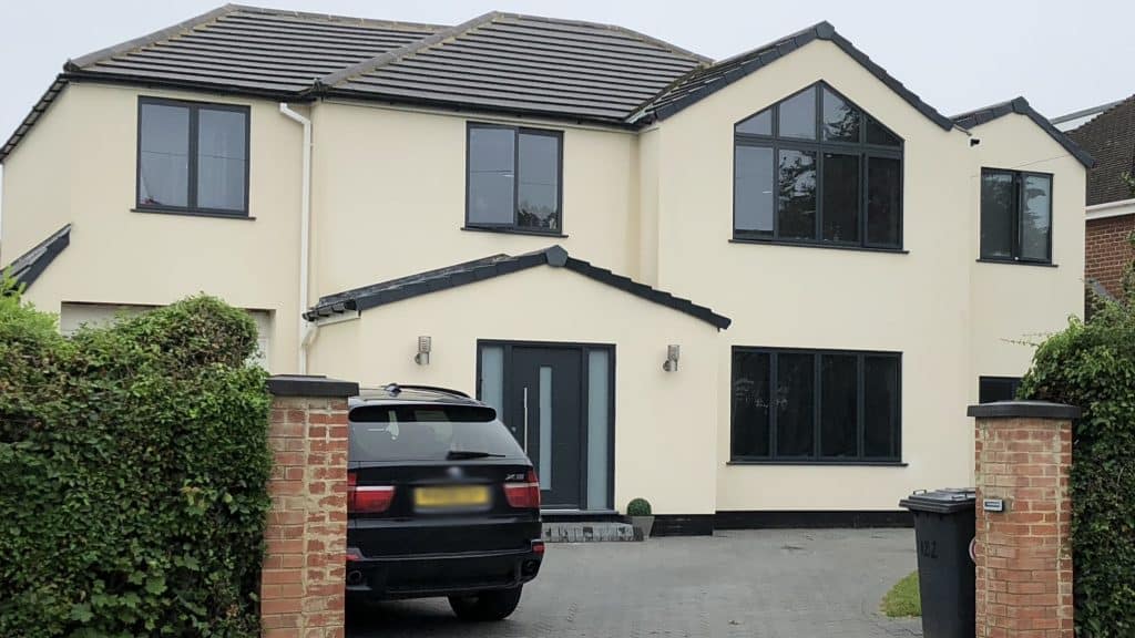 cream detached house with feature gable using origin ow70 windows