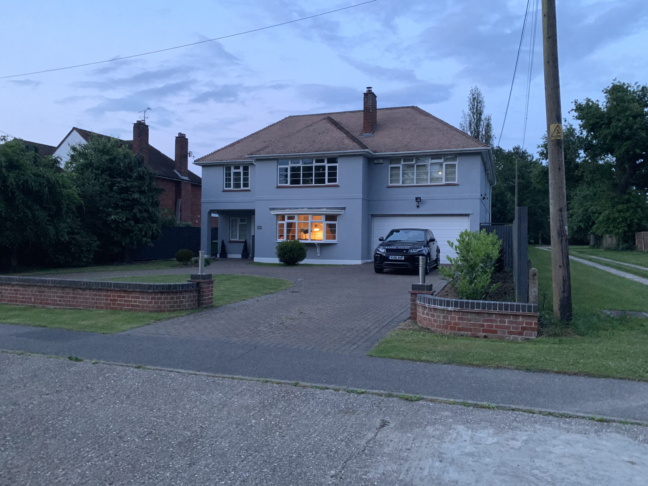 sheerline classic aluminium windows in a detached grey house