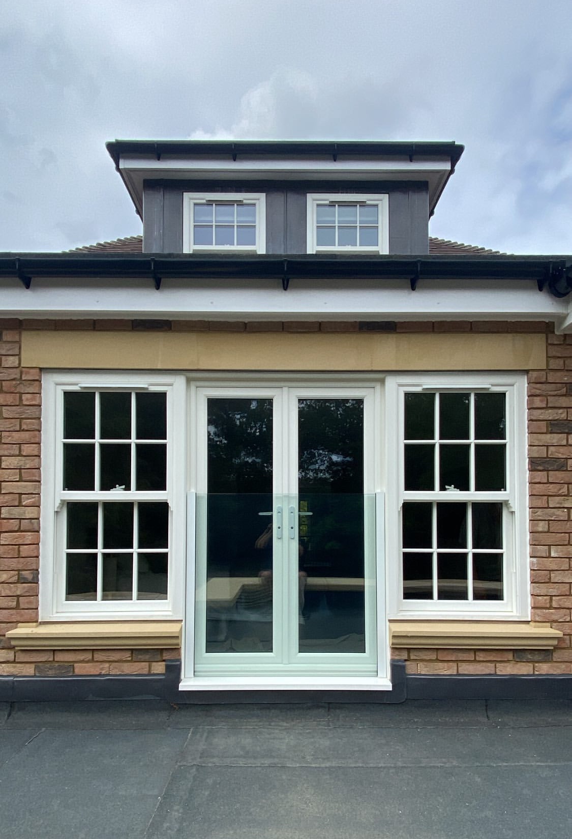 sliding sash windows in a victorian style extension with French Doors