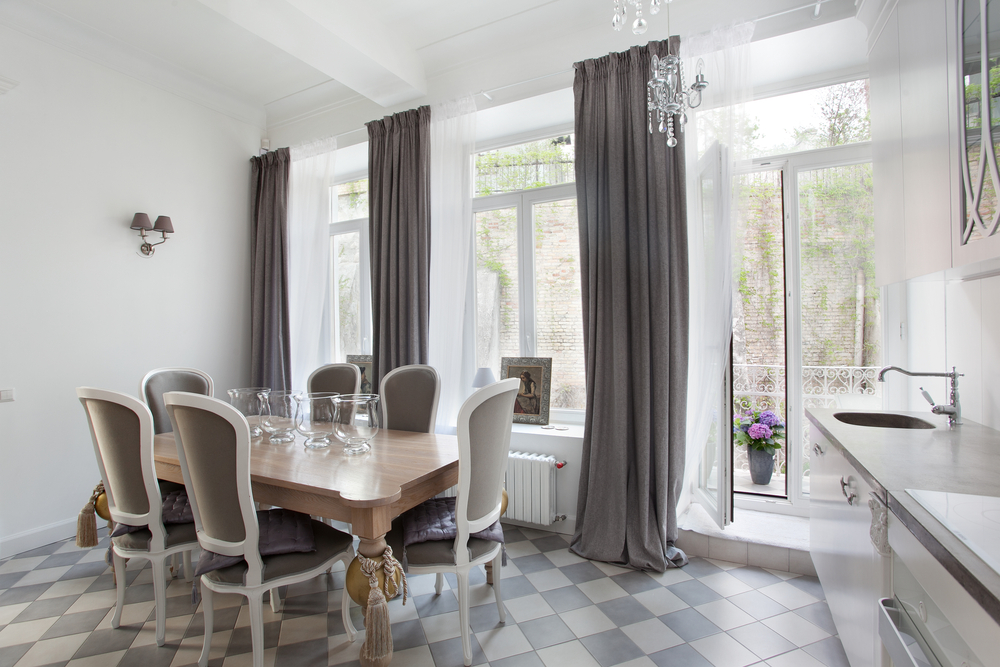 dining room with large liniar PVCu windows and french doors