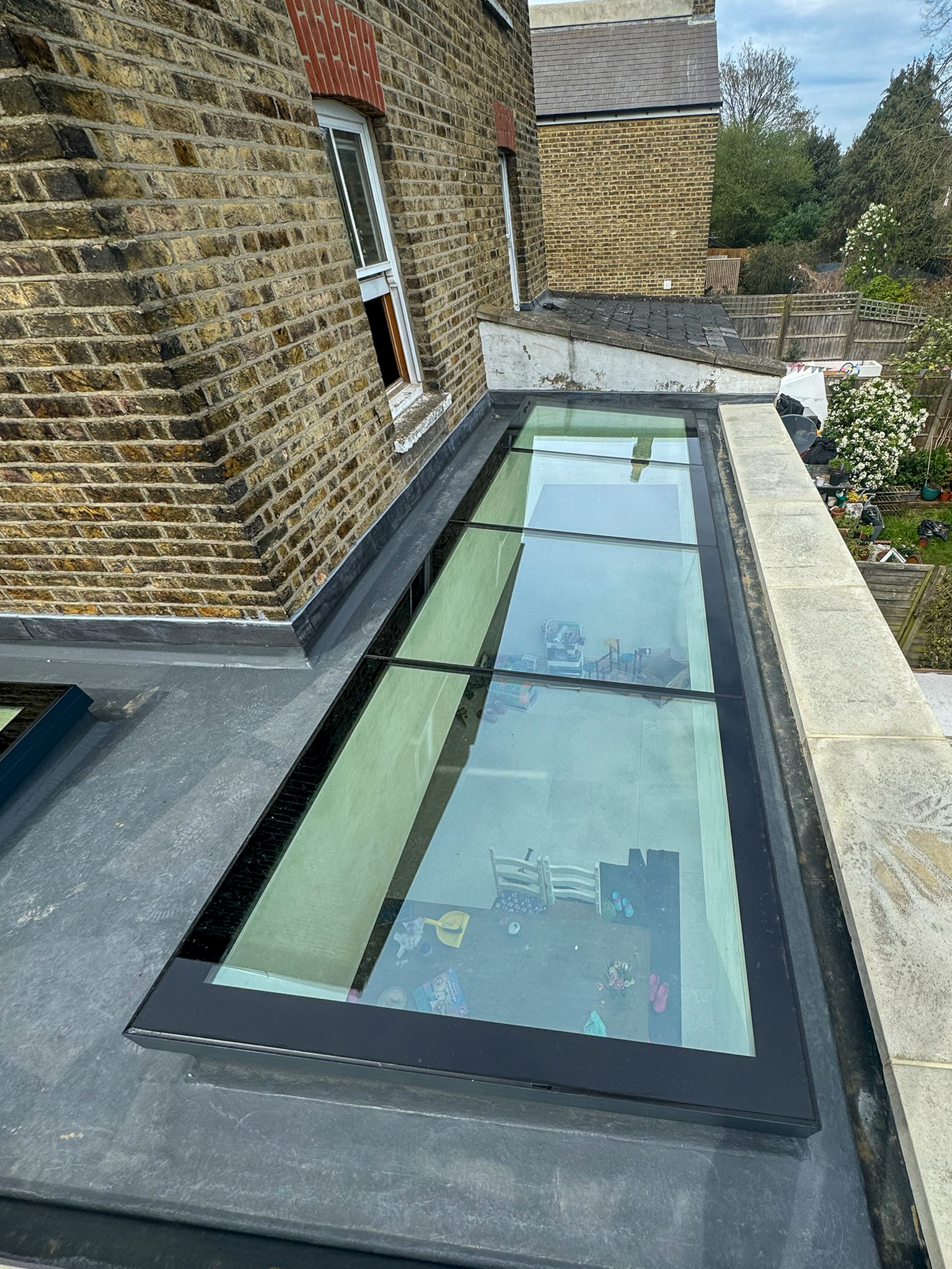 frameless roof in a london victorian house, viewed from above. 