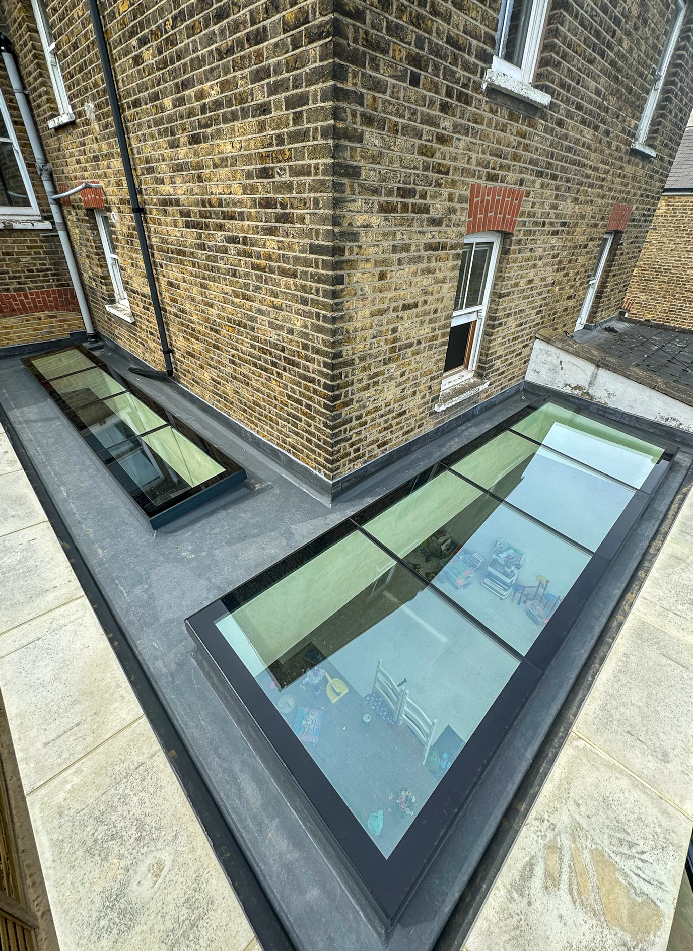 frameless roof in a london victorian house, viewed from above. 