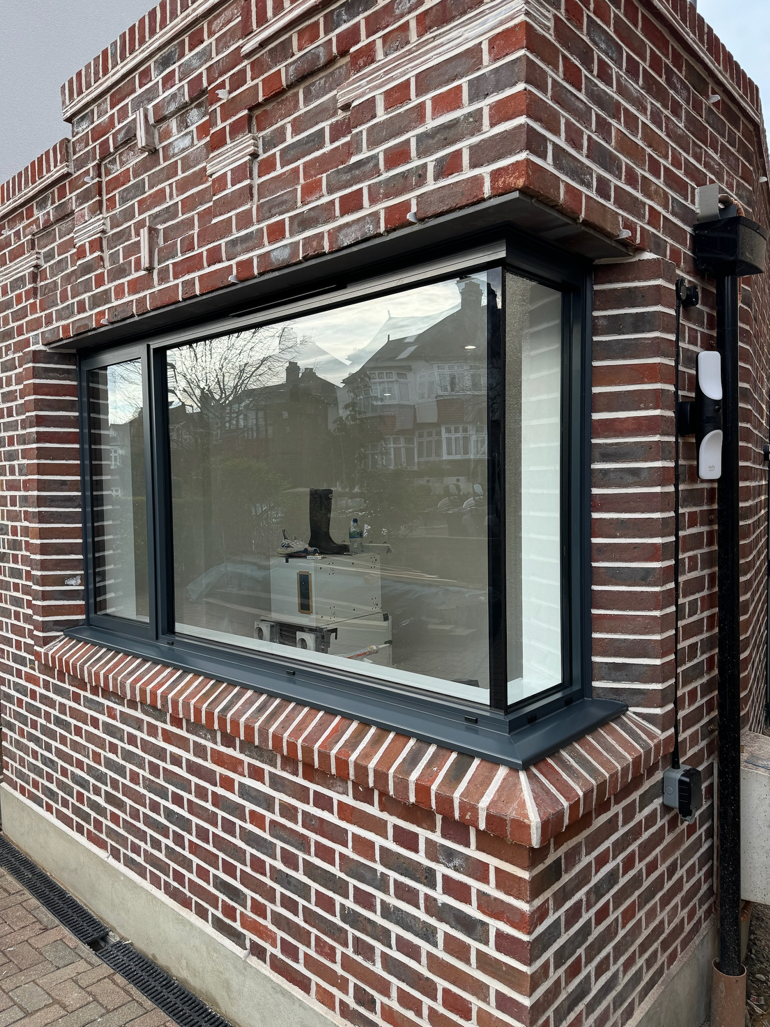 oriel window box window in a brick structure viewed from outside